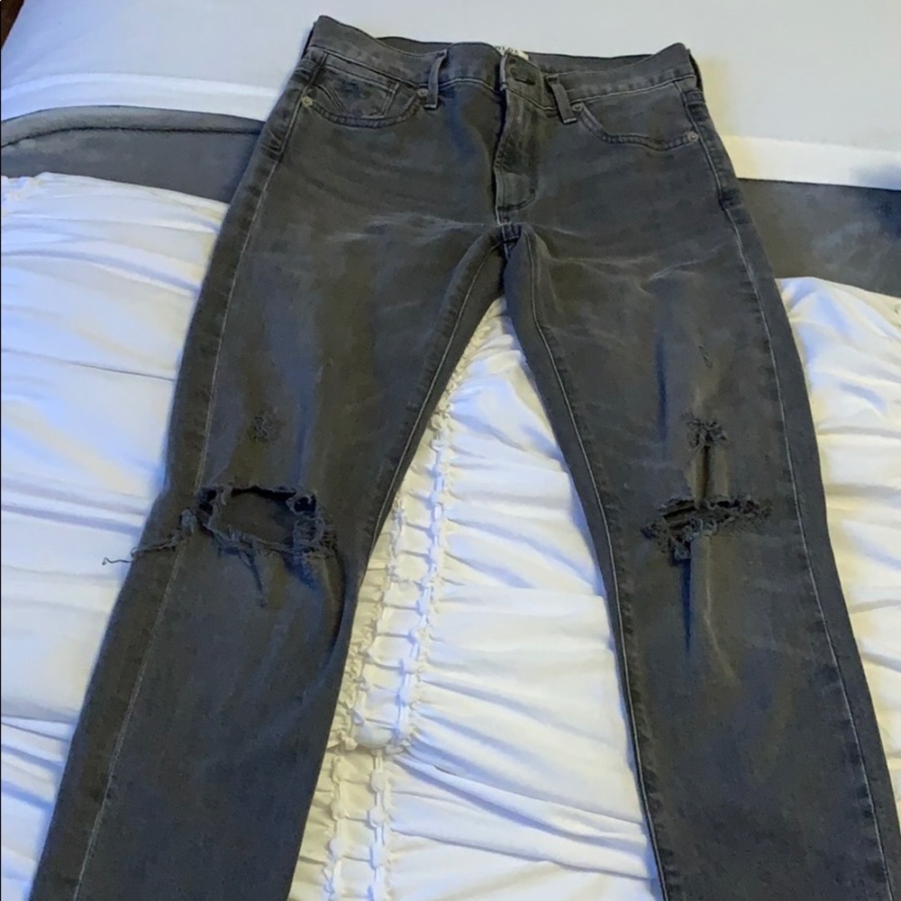 A gold E jeans